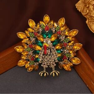 🦚 Gold Peacock Rhinestone Brooch with Multicolor Crystals – Statement Bird Pin